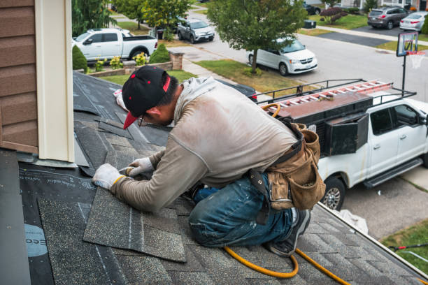 Professional Hail Damage Roof Repair technician working in Englewood Cliffs, NJ